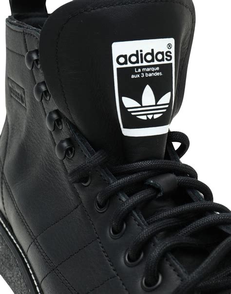 black addidas high top